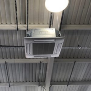 Air conditioning unit hanging from ceiling