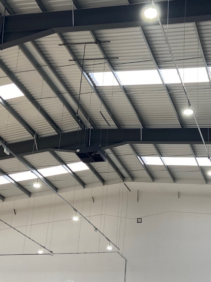 Air Conditioning Unit on a Warehouse Roof