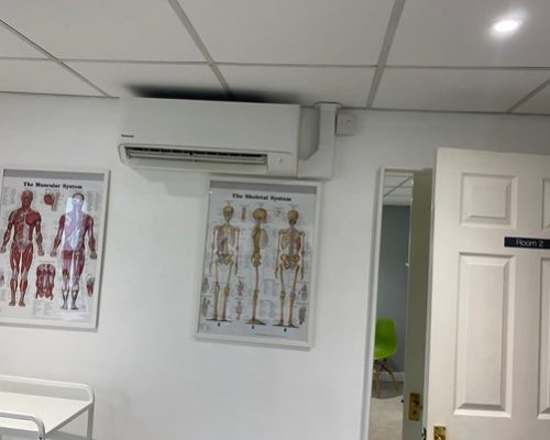 Air conditioning unit on white wall