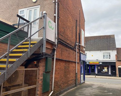 CW Therapy Rooms 3# Staircase and exterior of brick building