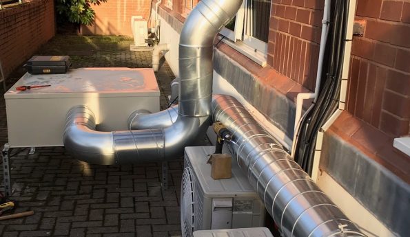 Air ventilation system outside brick building