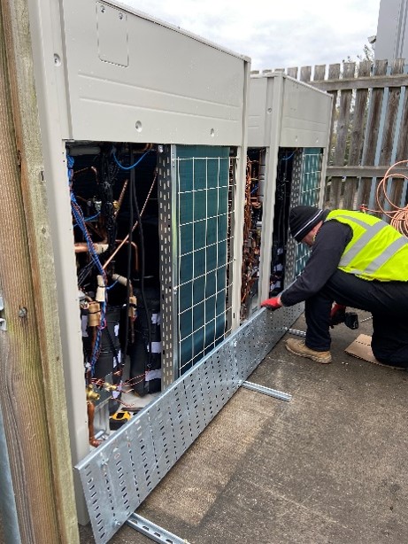 Large dismantled air ventilation units outside