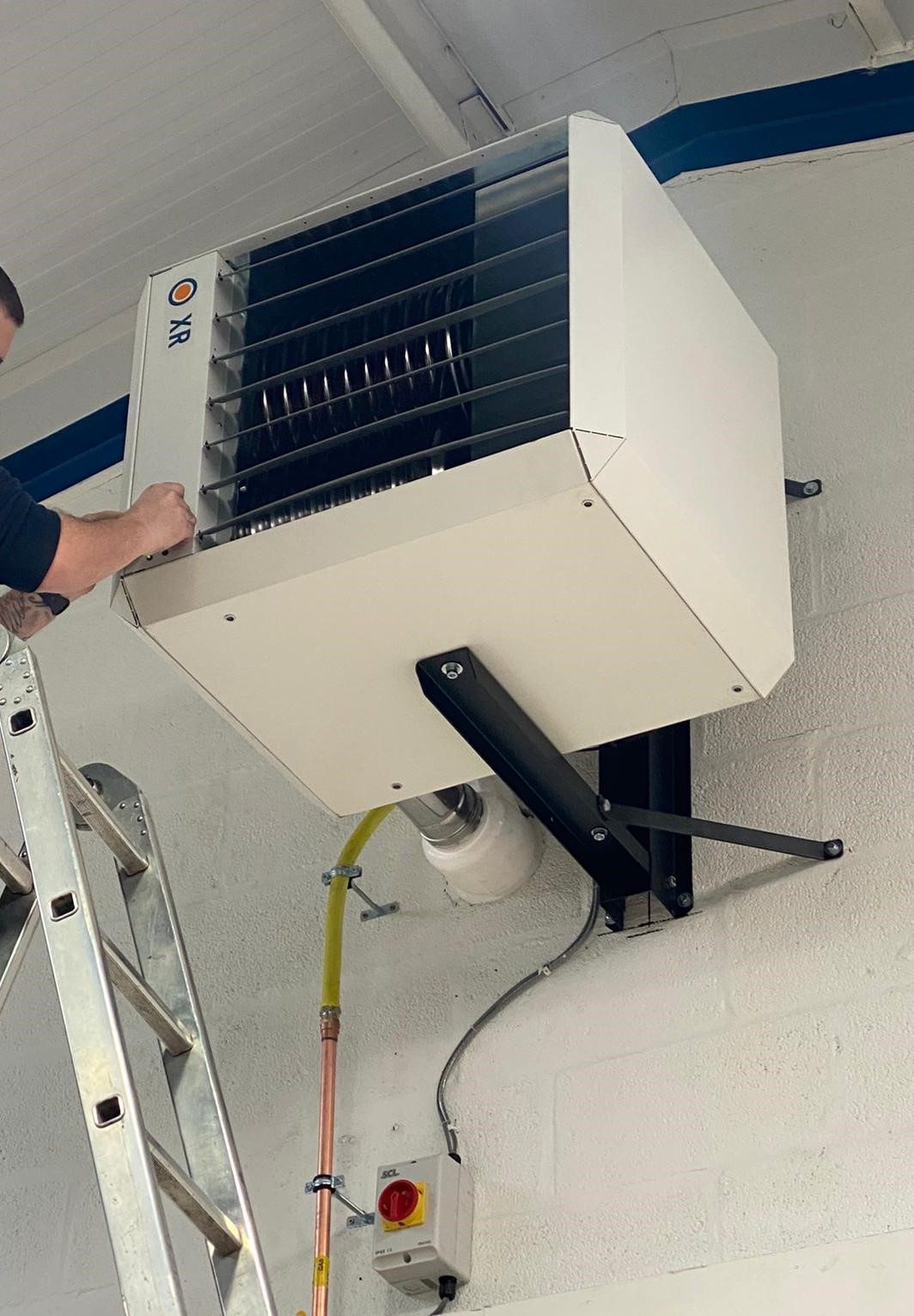 Man fixing air conditioning