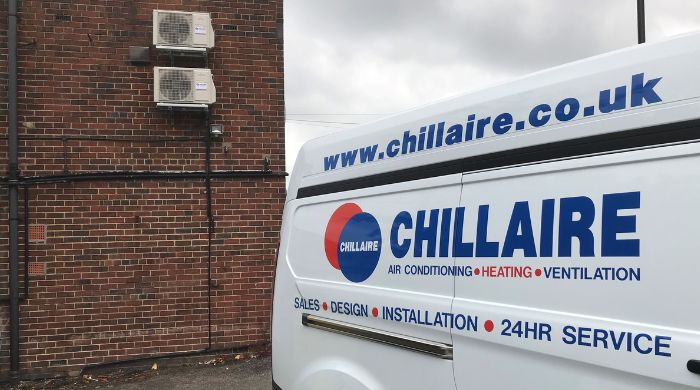 Chillaire van outside brick building