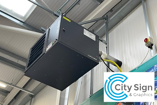 Air conditioning ventilation system near industrial ceiling