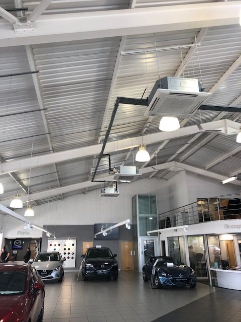 Ceiling air conditioning in car showroom