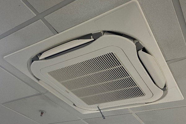 Air conditioning unit built into ceiling