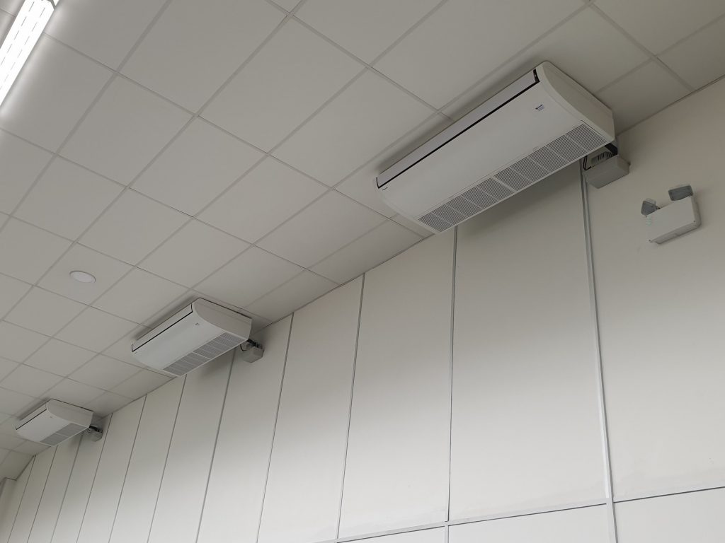 Air conditioning units on white wall