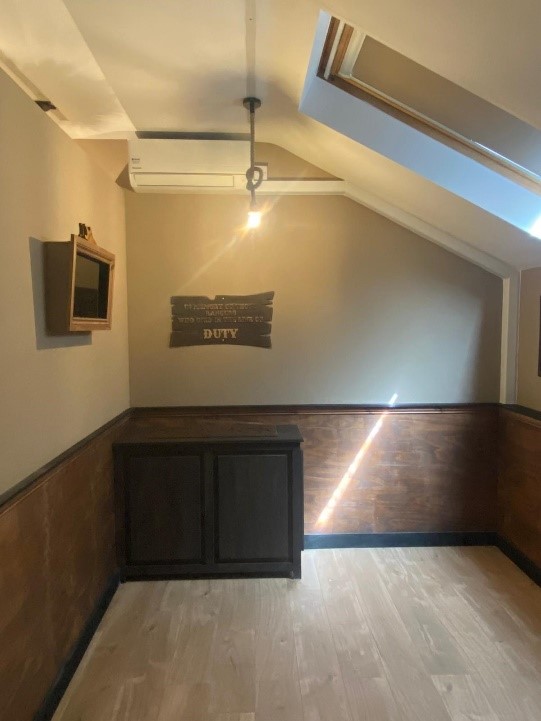 Pub room with air conditioning unit