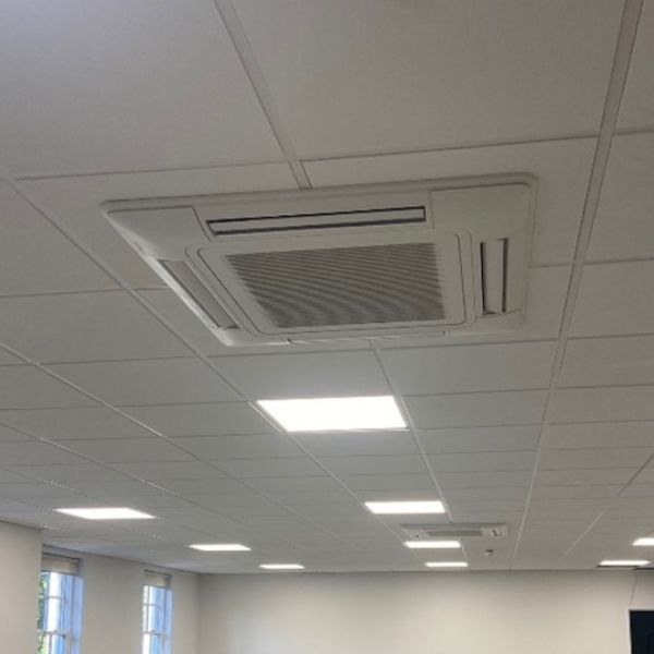Air source heat pump in commercial building's ceiling roof