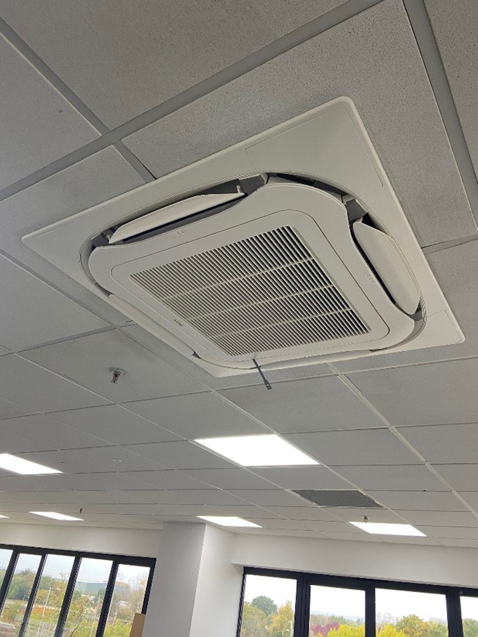 Air conditioning unit built into ceiling