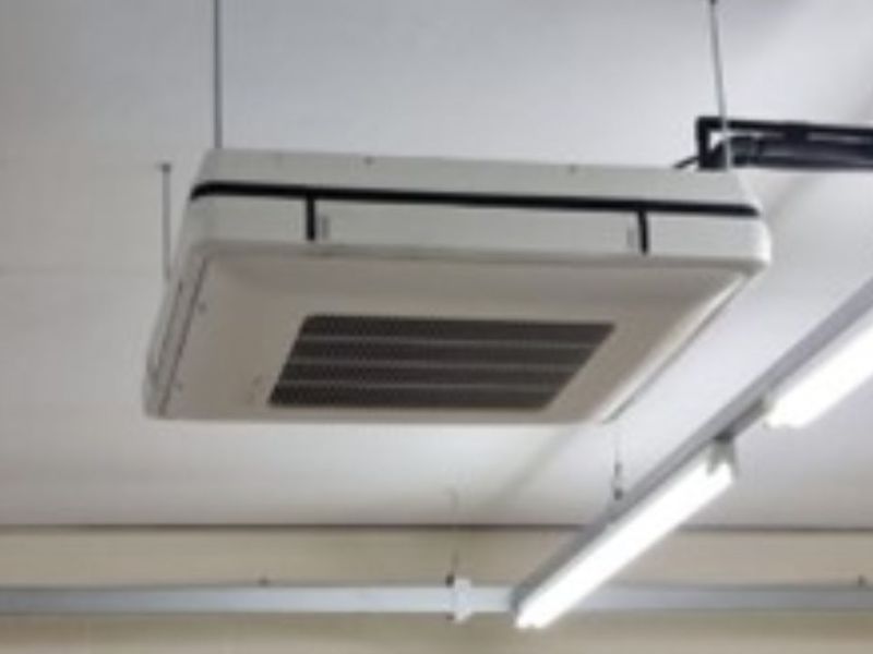 Air conditioning unit hanging from ceiling